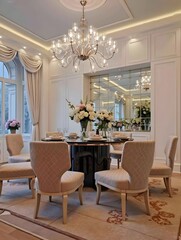 Elegant Dining Room with Plush Chairs and Floral Centerpiece