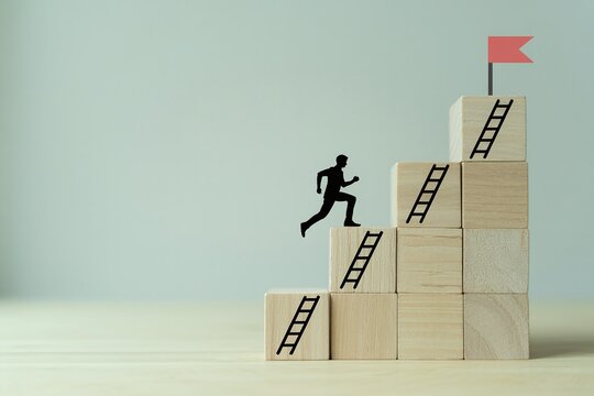 A silhouette of a man running up a wooden block staircase with a ladder on each step, toward a red flag at the summit.