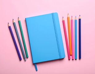 Colorful stationary on pink background
