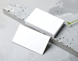 Blank business cards on concrete