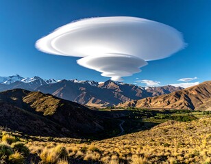Dramatic clouds over a mountain valley