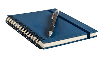 A blue spiral notebook with a pen lying on top of it against a black background in a studio shot