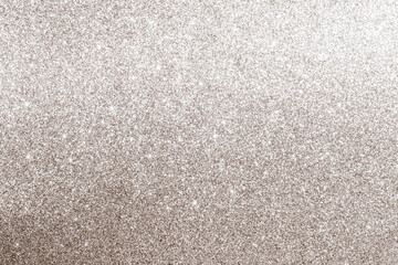 Fototapeta premium Textured golden glitter background with sparkling and shimmering details creating elegance