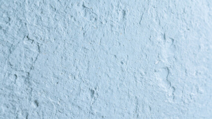 Fototapeta premium Textured light blue and pale green abstract surface with subtle relief and uneven patterns perfect for backgrounds and design elements