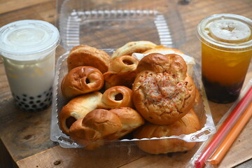 Asian breakfast with bakery goods and boba drinks