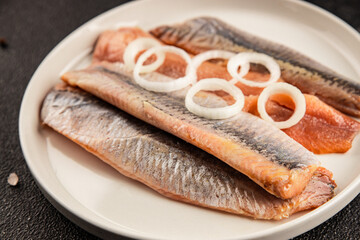 Herring fillet fish fresh seafood portion size natural product tasty snack fresh delicious gourmet food background on the table rustic top view copy space pescetarian diet