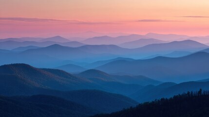 Obraz premium Misty mountain ranges at dawn (1)