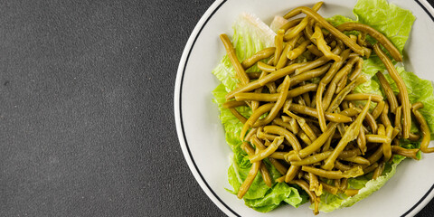 String beans snack green bean ready to eat vegetable natural product tasty snack fresh gourmet food background on the table rustic top view copy space keto and paleo diet vegan and vegan food