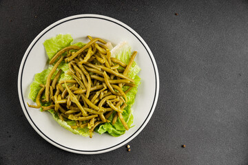 String beans snack green bean ready to eat vegetable natural product tasty snack fresh gourmet food background on the table rustic top view copy space keto and paleo diet vegan and vegan food