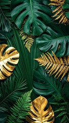 golden and green leaves, nature concept. Creative layout made of tropical leaves.
