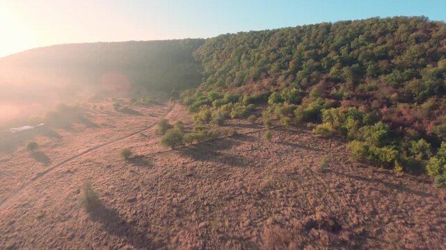 FPV drone aerial shot. Beautiful mountain view of nature landscape on a foggy morning. Moldova, Europe