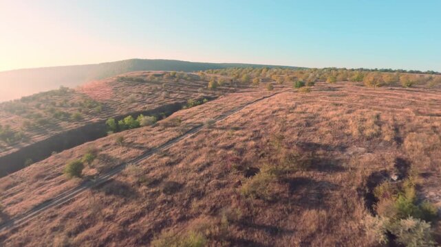 FPV drone aerial shot. Beautiful mountain view of nature landscape on a foggy morning. Moldova, Europe