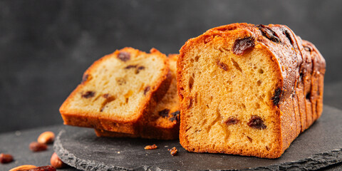Fruit cake sweet pastry fruitcake dessert dried fruits, nuts traditional baked goods natural product tasty snack fresh delicious gourmet food background on the table rustic top view copy space
