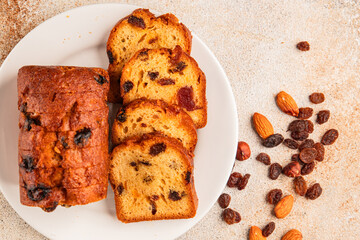 Fruit cake sweet pastry fruitcake dessert dried fruits, nuts traditional baked goods natural product tasty snack fresh delicious gourmet food background on the table rustic top view copy space
