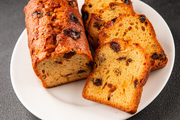 Fruit cake sweet pastry fruitcake dessert dried fruits, nuts traditional baked goods natural product tasty snack fresh delicious gourmet food background on the table rustic top view copy space