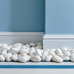 White stones lining a baseboard