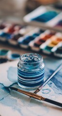 Blue watercolor paint jar