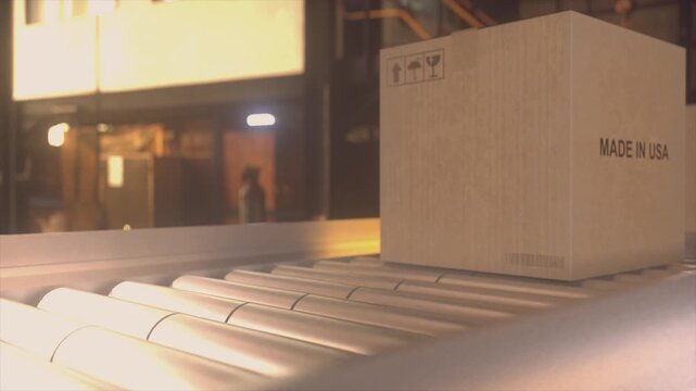 Cardboard Box With Made in USA Text on Conveyor Belt in Factory
