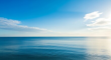 Fototapeta premium Serene Ocean Horizon Under a Clear Sky.