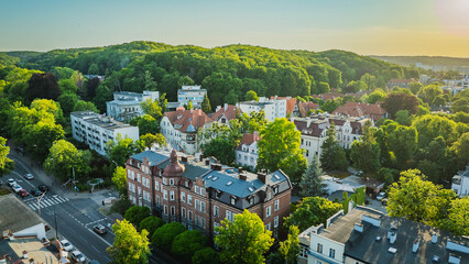 Fototapeta premium Gdansk, Wrzeszcz. Jaskowa Dolina in the evening. Beautiful view of the green valley and tenement houses.