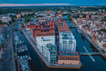 Drone view of Granary Island in Gdańsk in the morning and before sunrise. © Kamil