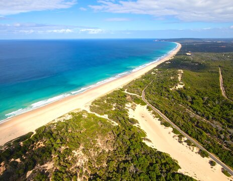 Aerial view of a pristine beach and coastline - Powered by Adobe