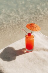 Tropical Cocktail on Beach - Refreshing Summer Drink with Umbrella.