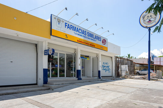 Facade of Farmacias similares pharmacy with banners and advertising of Dr. Simi. Guadalajara, Jalisco, Mexico, November 24, 2024.