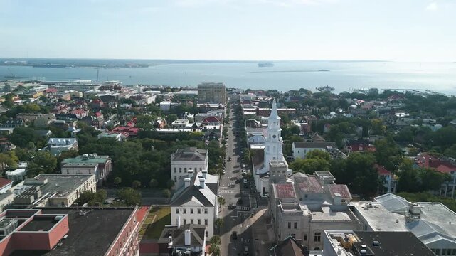 Charleston South Carolina city drone shot during the day flying down broad street panning down on four corners