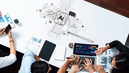 A dynamic business meeting showcasing collaboration on artificial intelligence, featuring laptops, documents, and data visualizations in a modern office environment. Raster