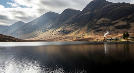 Obraz premium Remote Lochside Dwelling Amidst Majestic Mountains and Still Waters