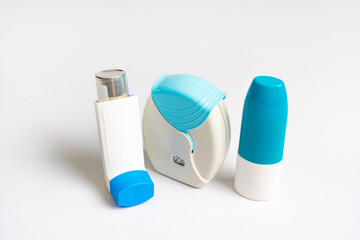 Set of asthma inhalers for asthma and COPD patients. Bronchodilator medicine with salbutamol for patients with asthma, allergy and Chronic Obstructive Pulmonary Diseaseon on white background.