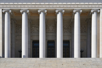 The columns of the Capitol in Havana against the backdrop of a clear blue sky.