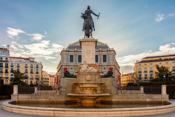 Fototapeta premium Monument to Felipe IV on Eastern square (Plaza de Oriente) and Royal theatre (Teatro Real), Madrid, Spain