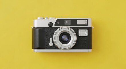 Capture the Moment with a Classic Vintage Camera on Bright Yellow Background for Nostalgic Photography Projects or a Stylish Retro Design Element