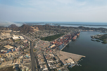 Fototapeta premium defaultaerial view of the port of manzanillo, entrance to the port of manzanillo, trucks waiting to be loaded. Manzanillo, Colima, Mexico, March 29, 2024.