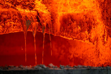 Molten Aluminum in Industrial Furnace – Metal Melting Process at High Temperature