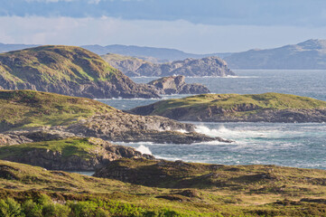Atlantic waves crashing against the islands surrounding Badcall Bay by Scourie on the west coast of Scotland