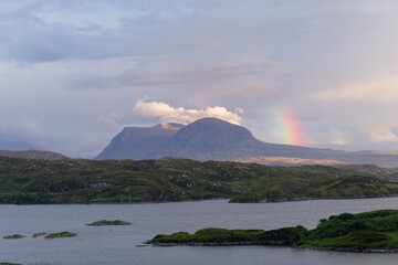 Rainbow forming next to the Quinag mountain range. Photograph taken from Upper Badcall Bay.