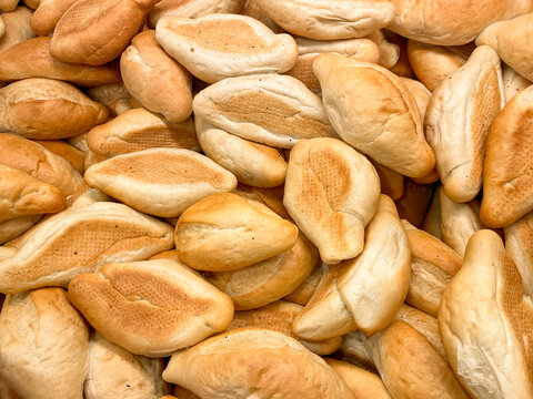 many bolillo breads, bolillos in the bakery