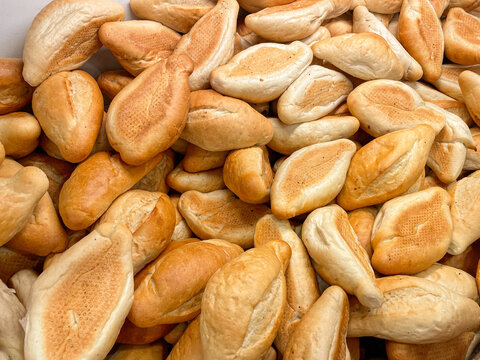 many bolillo breads, bolillos in the bakery