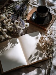 A warm, inviting scene featuring an open journal, dried flowers, and a dark cup, bathed in natural sunlight.