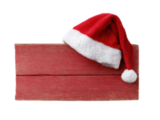 Christmas hat placed on red wooden board for festive decoration on a transparent background, cut out