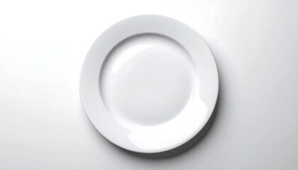 Empty white plate on a white surface