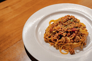 Spaghetti Bolognese pasta with meat sauce on plate
