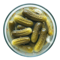 Pickles in a glass bowl, viewed from above, submerged in clear liquid