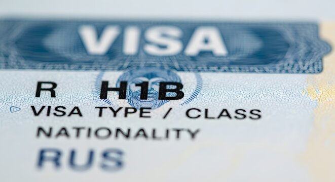 Closeup of an h1b visa stamp on a document