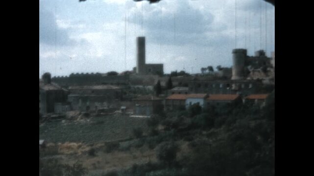 Tarquinia, Italy 1964 - Viewing the Italian town of Tarquinia, from the Tower of Santa Maria di Castello to the Matilda of Canossa Tower, in 1964.
