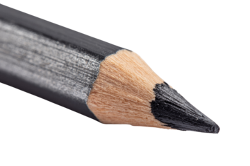 Close-up of a sharpened black pencil tip, showcasing wood and graphite texture. background removed
