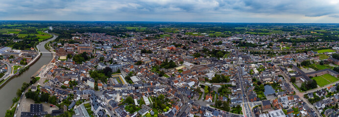 Aerial panorama view around the downtown of the city Wetteren in Belgium on a cloudy afternoon in summer